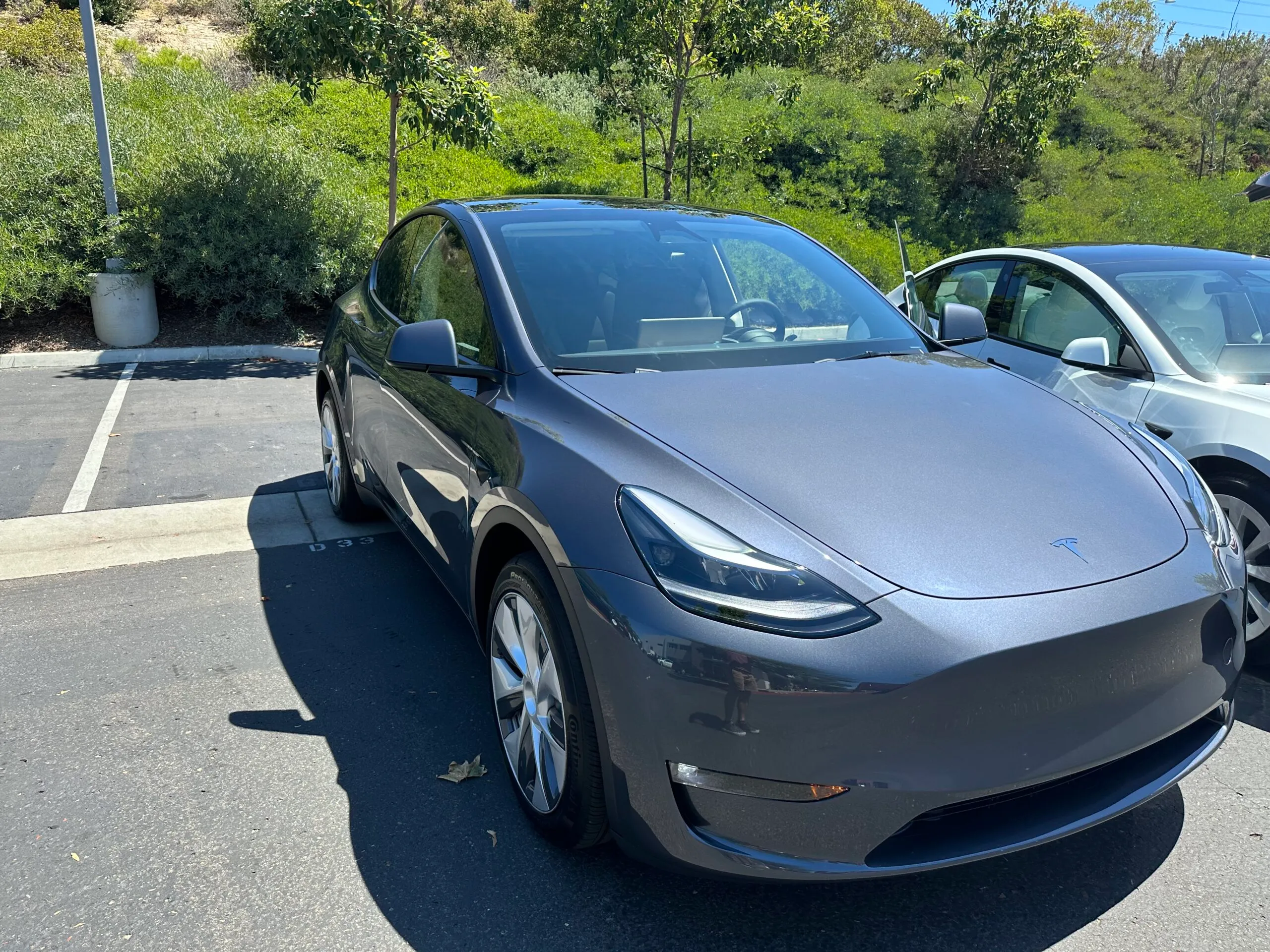 Tesla in parking lot ready for a road trip