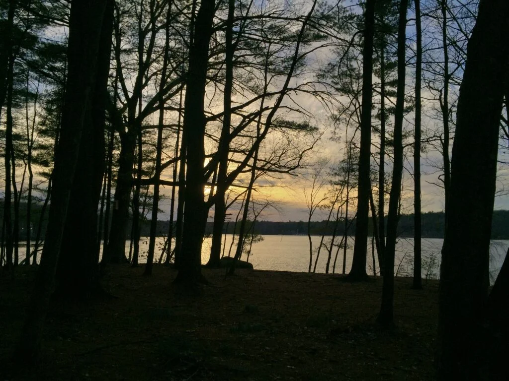 Lake view near Sandy beach at dusk; what to do in Hopkinton, Massachusetts